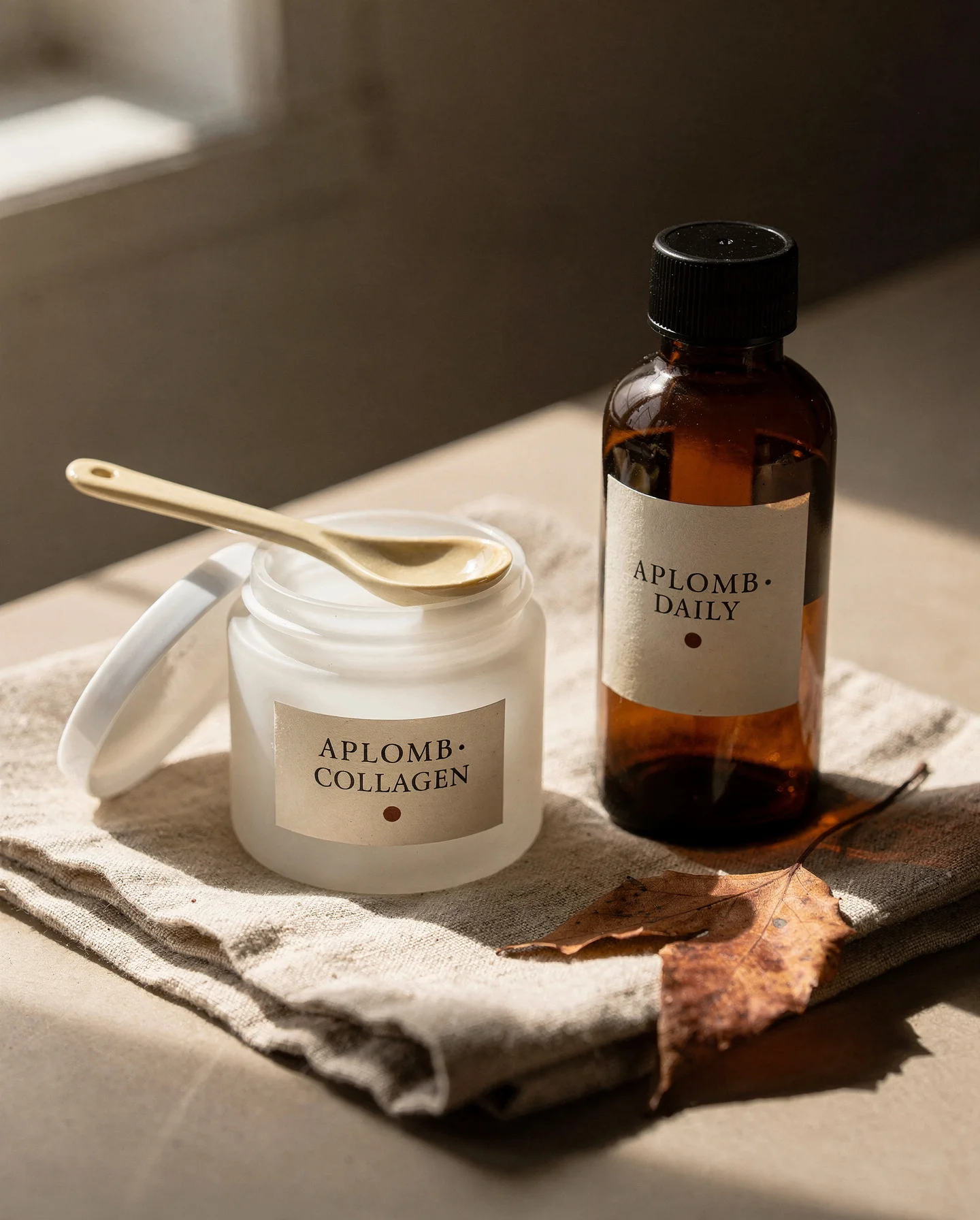 The four APLOMB products together: Facial Serum, Protein, Roots, and Calm.