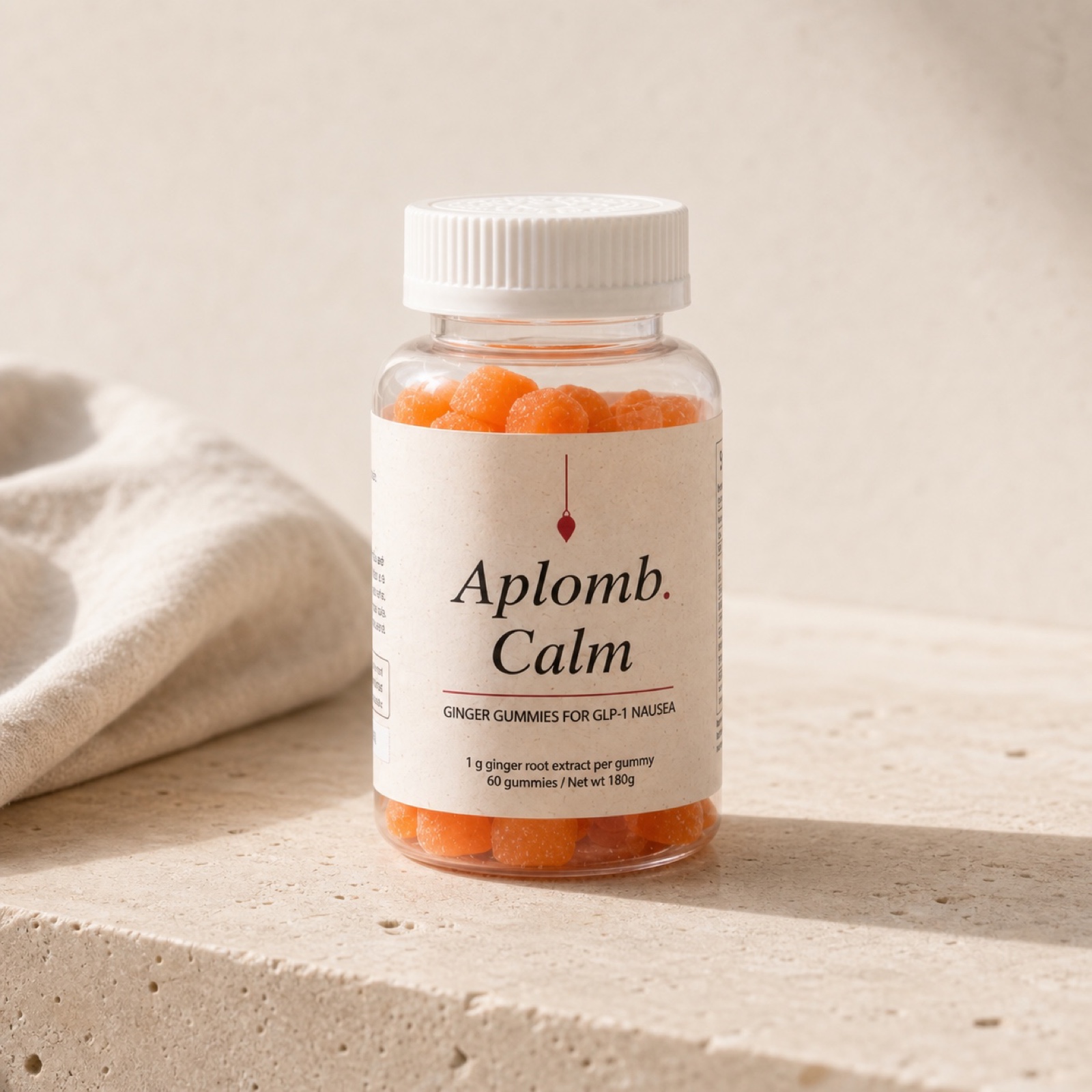 APLOMB Steady ginger gummies jar on a stone counter