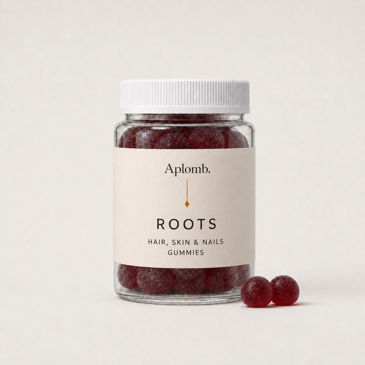 APLOMB. Roots gummies bottle